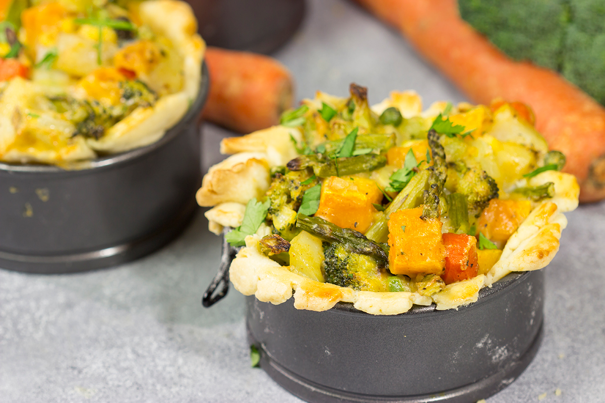 Tired of the same old vegetables as a side dish? Put 'em in a pot pie! Packed with an assortment of roasted veggies, this Roasted Veggie Pot Pie is a unique and tasty dinner recipe!