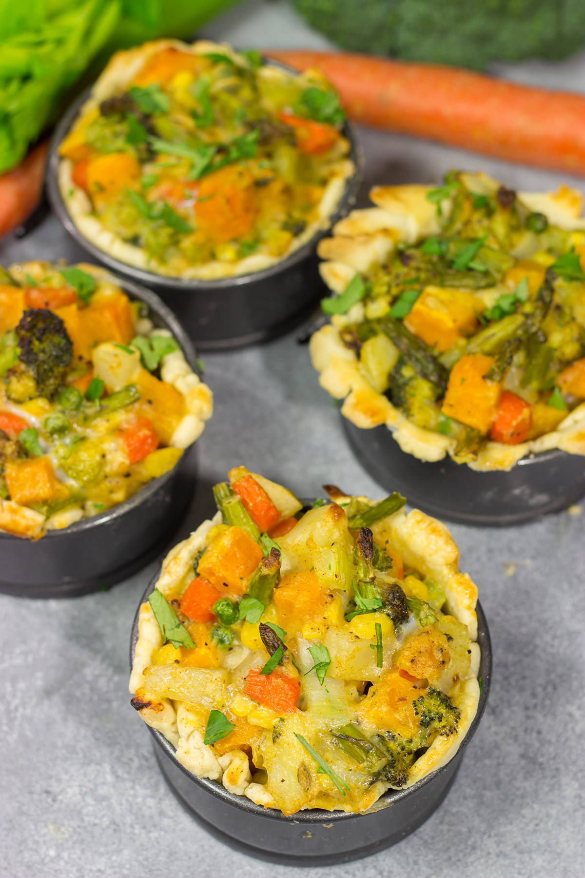 Tired of the same old vegetables as a side dish? Put 'em in a pot pie! Packed with an assortment of roasted veggies, this Roasted Veggie Pot Pie is a unique and tasty dinner recipe!