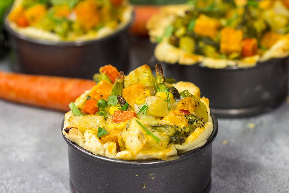 Tired of the same old vegetables as a side dish? Put 'em in a pot pie! Packed with an assortment of roasted veggies, this Roasted Veggie Pot Pie is a unique and tasty dinner recipe!