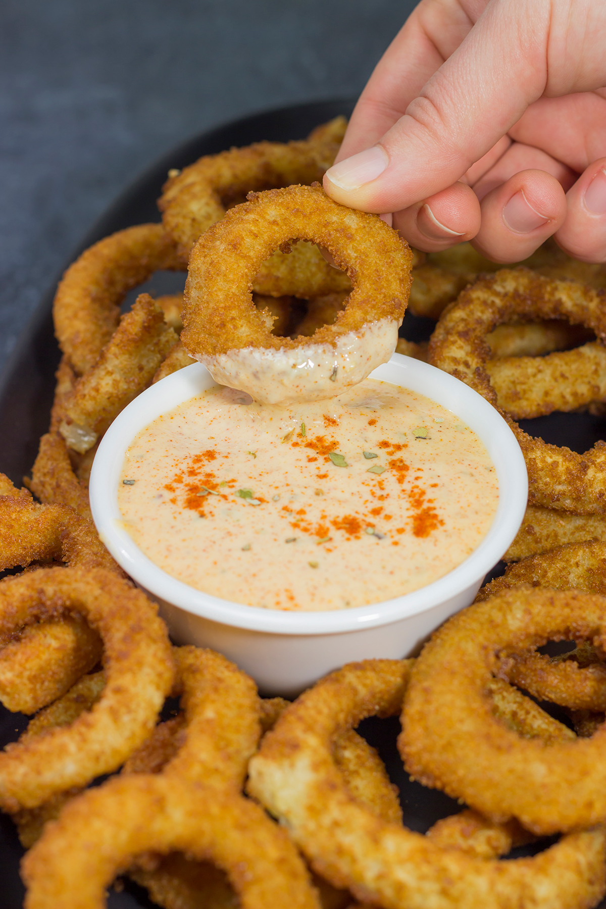 This Copycat Outback Bloomin' Onion Sauce is an easy way to make the restaurant version at home. Grab a bag of onion rings or fries and make a batch this weekend!