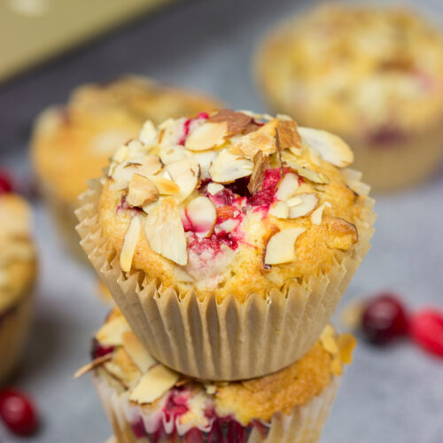 Packed with cranberries and topped with sliced almonds, these Cranberry Almond Muffins are a tasty way to start the morning!