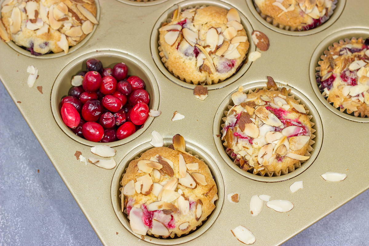 Packed with cranberries and topped with sliced almonds, these Cranberry Almond Muffins are a tasty way to start the morning!