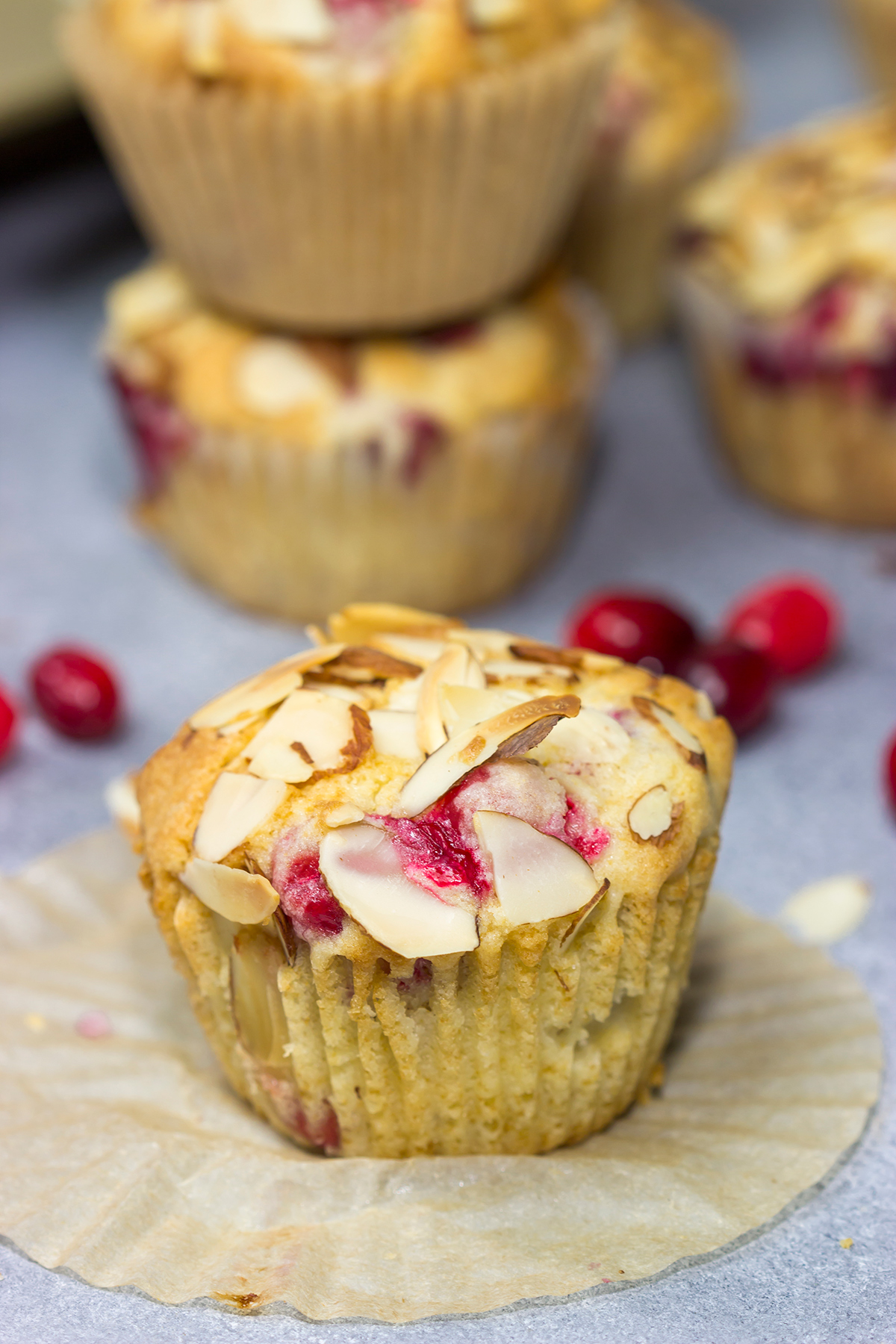 Packed with cranberries and topped with sliced almonds, these Cranberry Almond Muffins are a tasty way to start the morning!