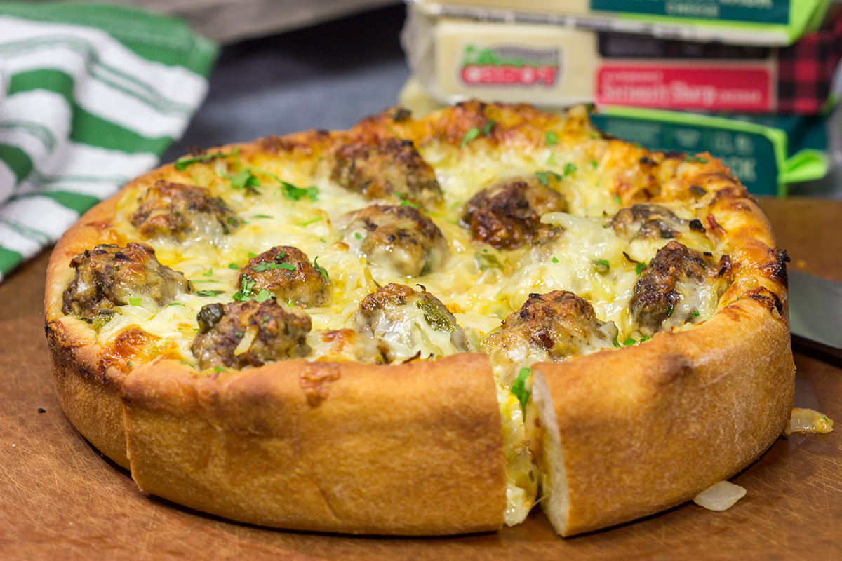 Pull out the springform pan...for pizza! Filled with 2 types of cheese, meatballs and seasonings, this Deep Dish Meatball Pizza is a fun way to mix up pizza night!