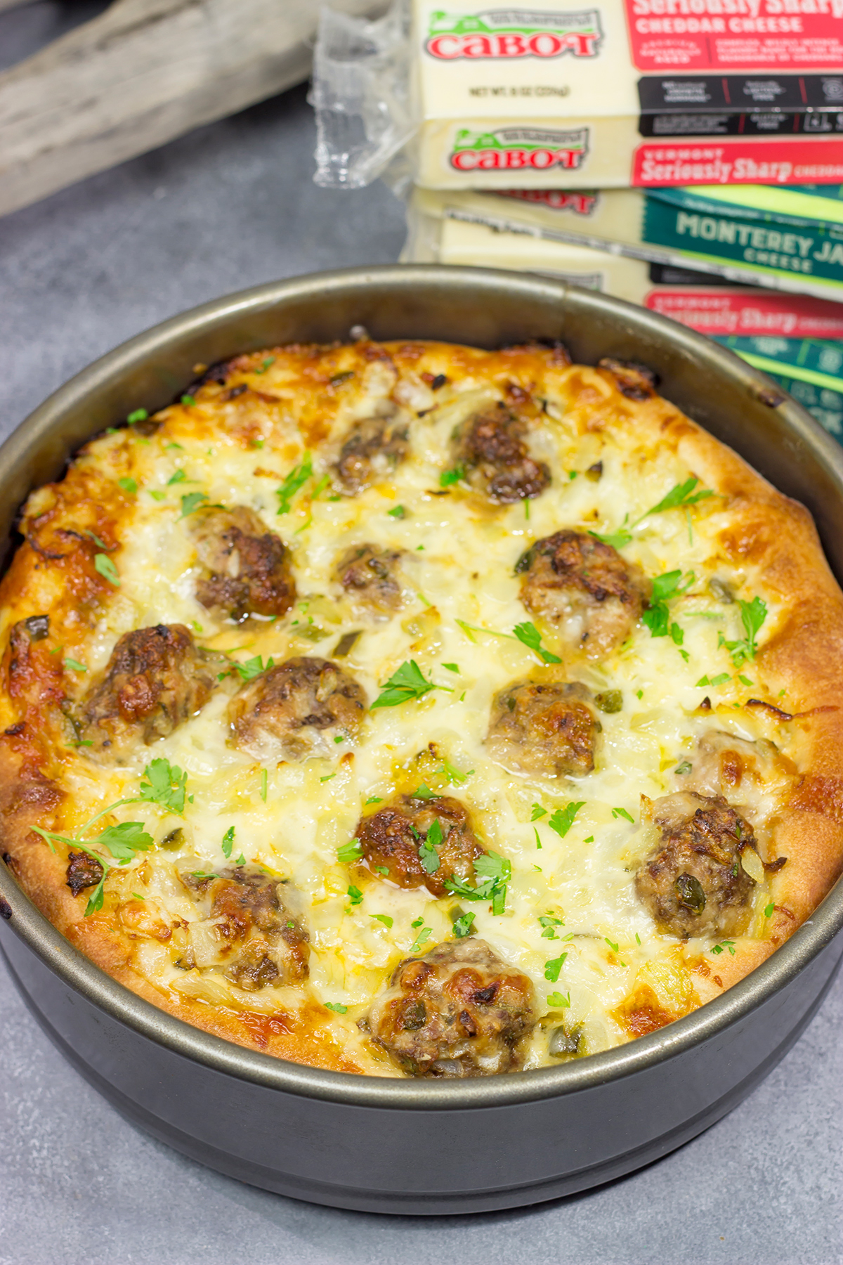 Pull out the springform pan...for pizza! Filled with 2 types of cheese, meatballs and seasonings, this Deep Dish Meatball Pizza is a fun way to mix up pizza night!