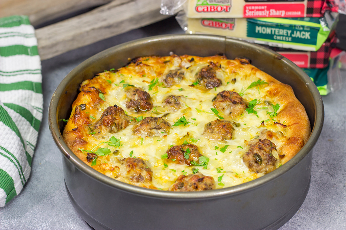 Pull out the springform pan...for pizza! Filled with 2 types of cheese, meatballs and seasonings, this Deep Dish Meatball Pizza is a fun way to mix up pizza night!