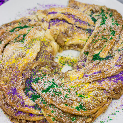 This Easy King Cake uses refrigerated crescent dough instead of the traditional yeasted dough. It's an easy - and delicious - way to celebrate Mardi Gras!