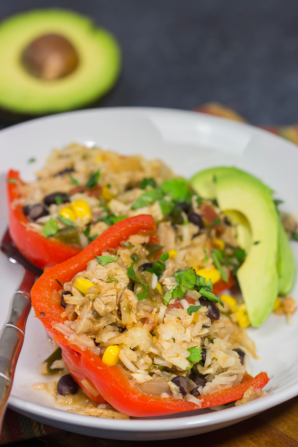 Looking for a fun way to mix up the dinner routine? Pull out the slow cooker! These Slow Cooker Southwestern Stuffed Peppers are a favorite in our house!