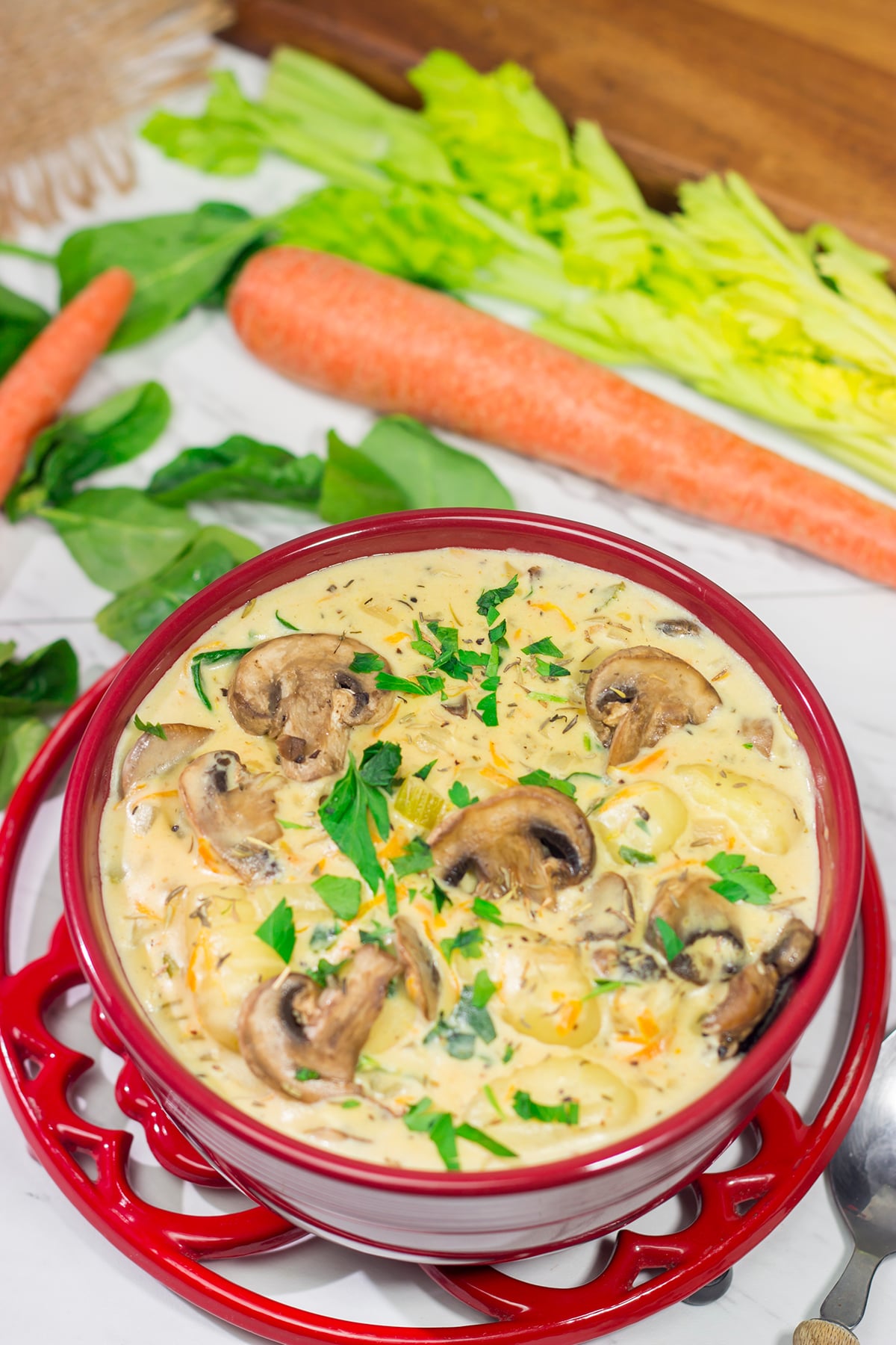 Filled with sautéed mushrooms and potato gnocchi, this Creamy Mushroom Gnocchi Soup is a great way to warm up on a cold winter night!