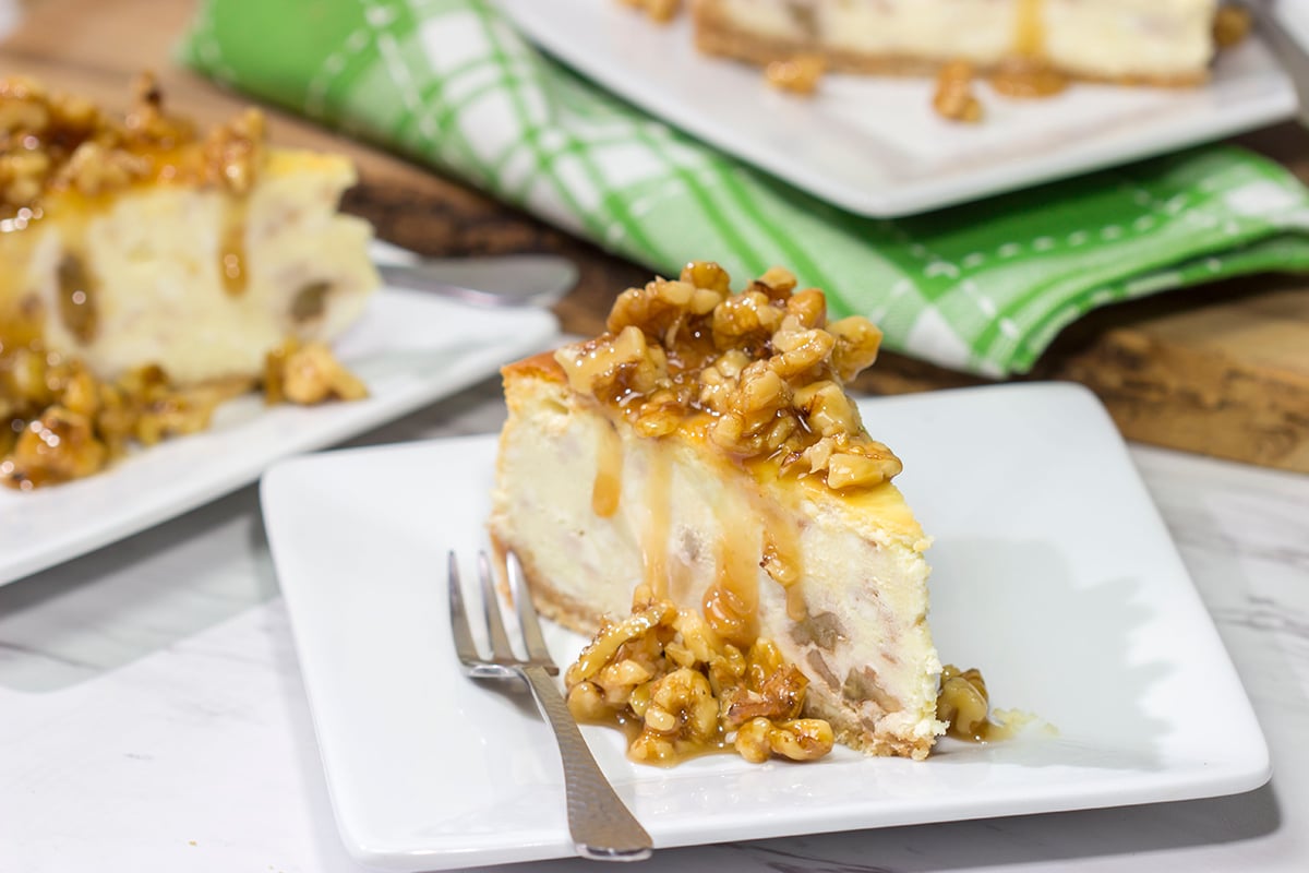 Featuring a warm honey walnut topping on top of a classic cheesecake, a slice of this Honey Walnut Cheesecake is a great way to end the day!