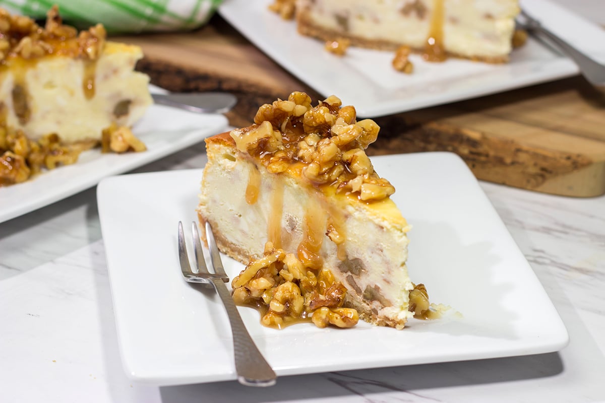 Featuring a warm honey walnut topping on top of a classic cheesecake, a slice of this Honey Walnut Cheesecake is a great way to end the day!