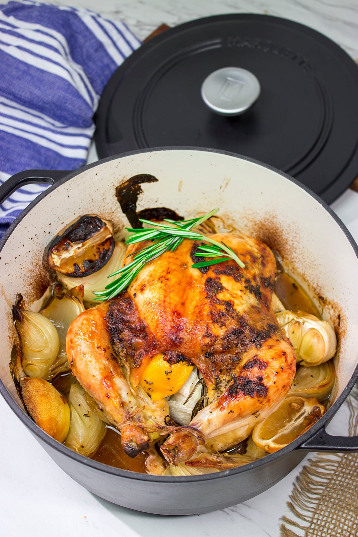 This easy Lemon Rosemary Roasted Chicken features a garlic-herb butter that creates a juicy chicken with crispy, flavorful skin!