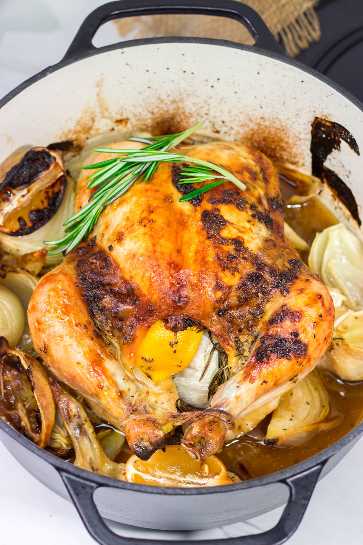 This easy Lemon Rosemary Roasted Chicken features a garlic-herb butter that creates a juicy chicken with crispy, flavorful skin!