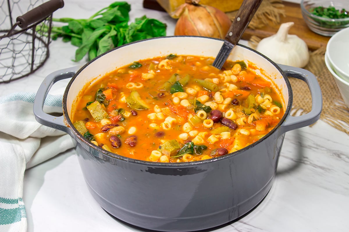 Minestrone Soup is an example of rustic Italian comfort food at its best! Serve this vegetable soup with Italian bread for an easy winter meal!