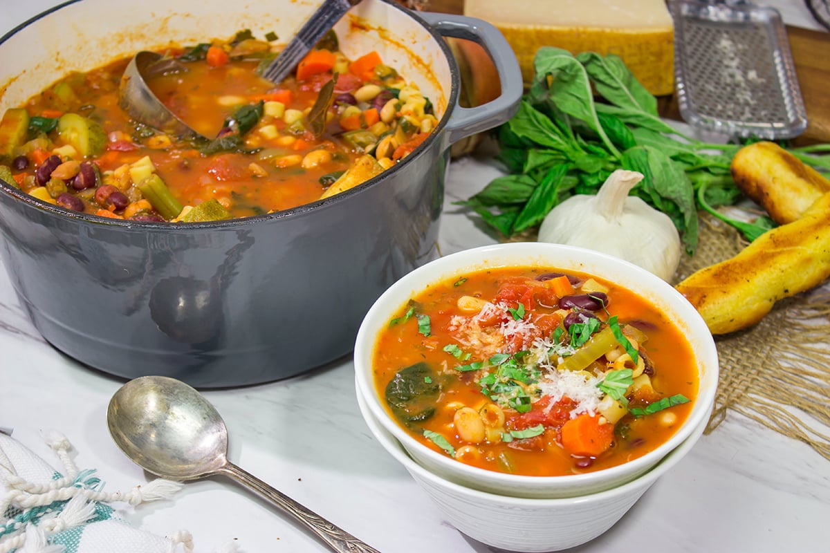 Minestrone Soup is an example of rustic Italian comfort food at its best! Serve this vegetable soup with Italian bread for an easy winter meal!