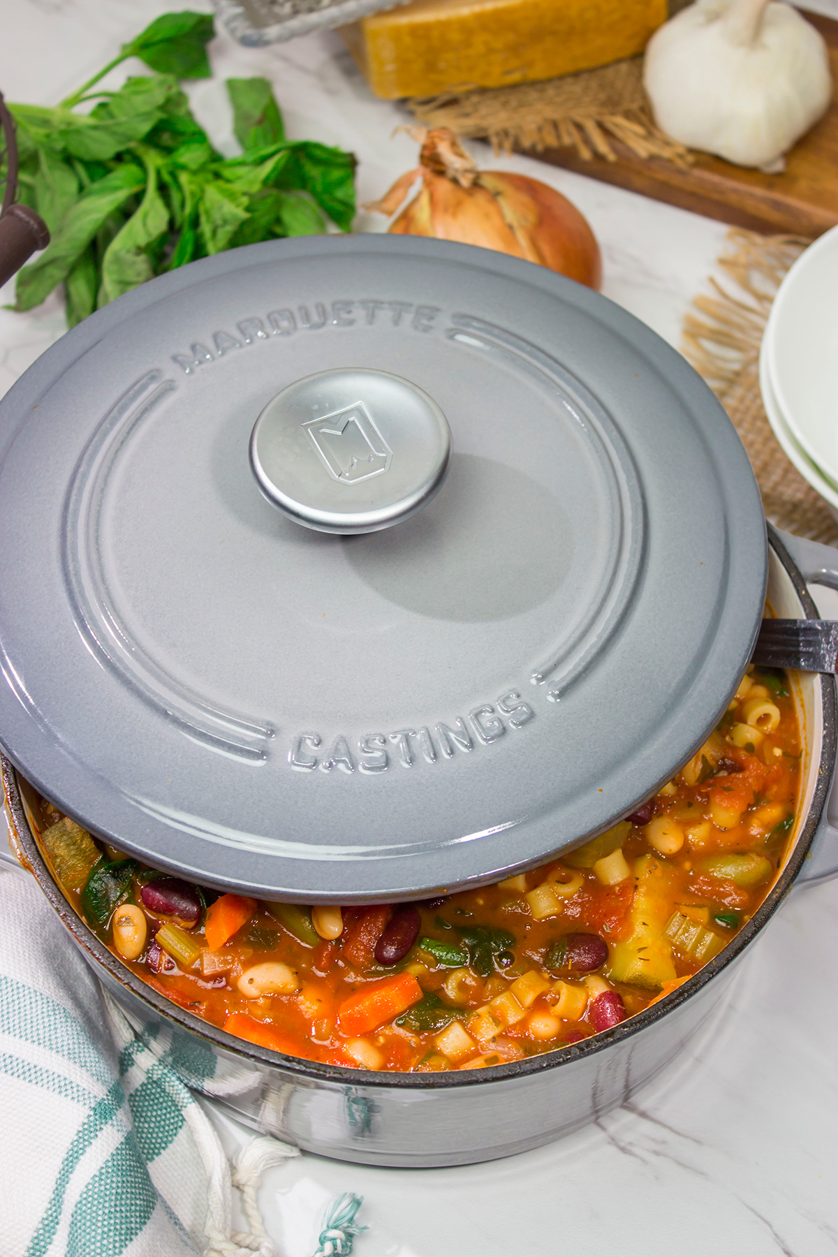 Minestrone Soup is an example of rustic Italian comfort food at its best! Serve this vegetable soup with Italian bread for an easy winter meal!