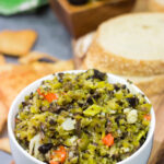 Often used in the classic New Orleans sandwich, a good Muffaletta Olive Salad is delicious in its own right. Spread it on top of grilled chicken or serve with pita chips as a dip!