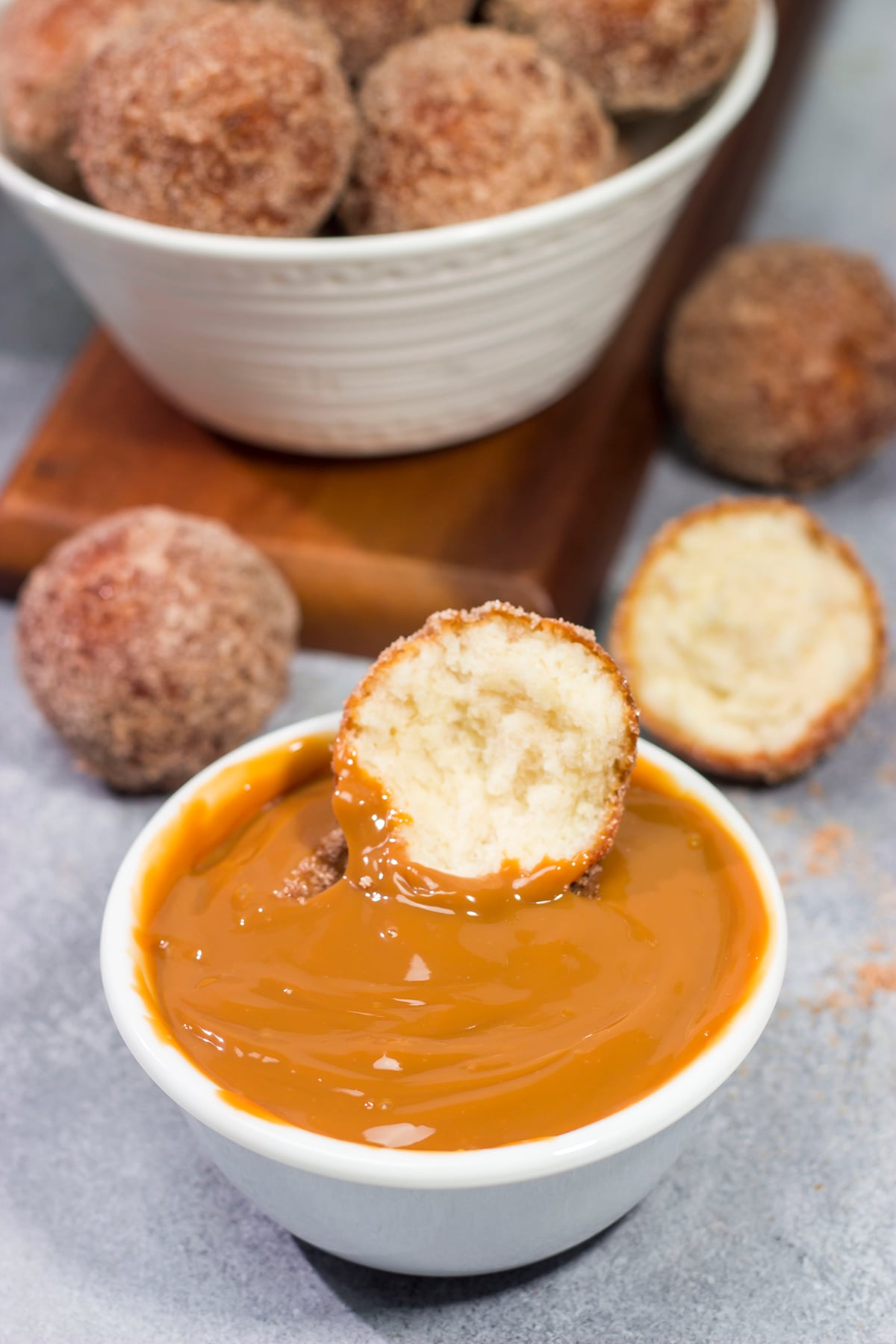 Served with homemade dulce de leche for dipping, these Snickerdoodle Donut Holes are packed with cinnamon sugar flavor!