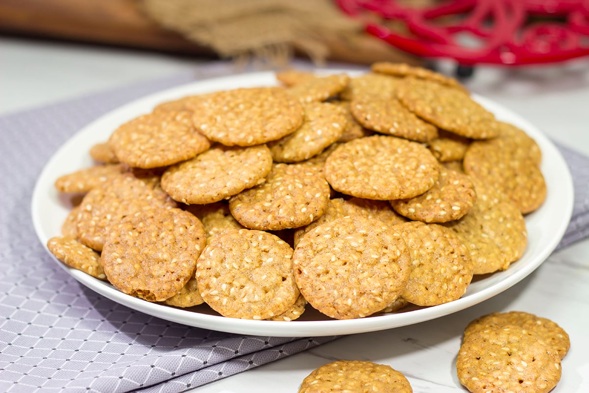 Filled with toasted sesame seeds, Charleston Benne Wafers are an iconic sweet treat from the Lowcountry region of South Carolina. Bake up a batch today!
