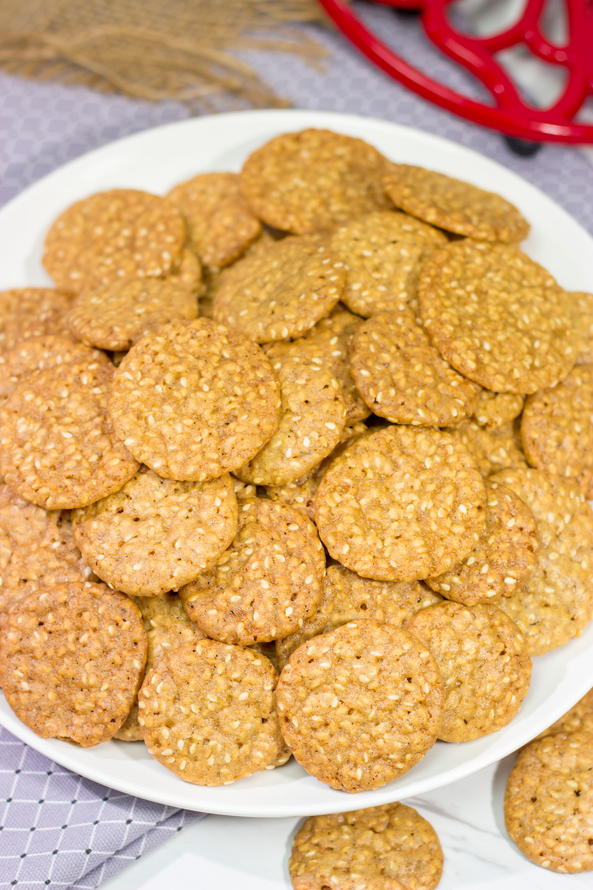 Filled with toasted sesame seeds, Charleston Benne Wafers are an iconic sweet treat from the Lowcountry region of South Carolina. Bake up a batch today!