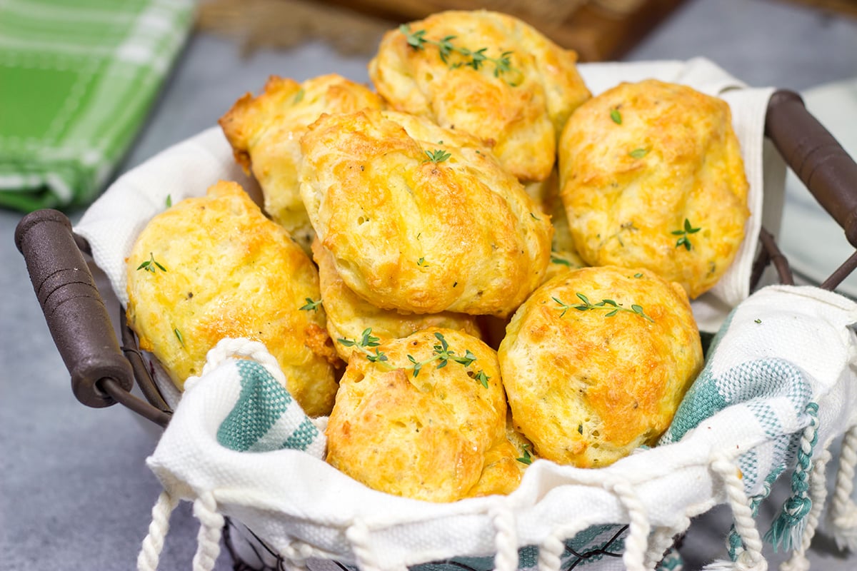 These Cheddar Cheese Puffs (also called Gougeres) are light and airy, and they melt in your mouth. They're great as an appetizer or served next to a bowl of soup!