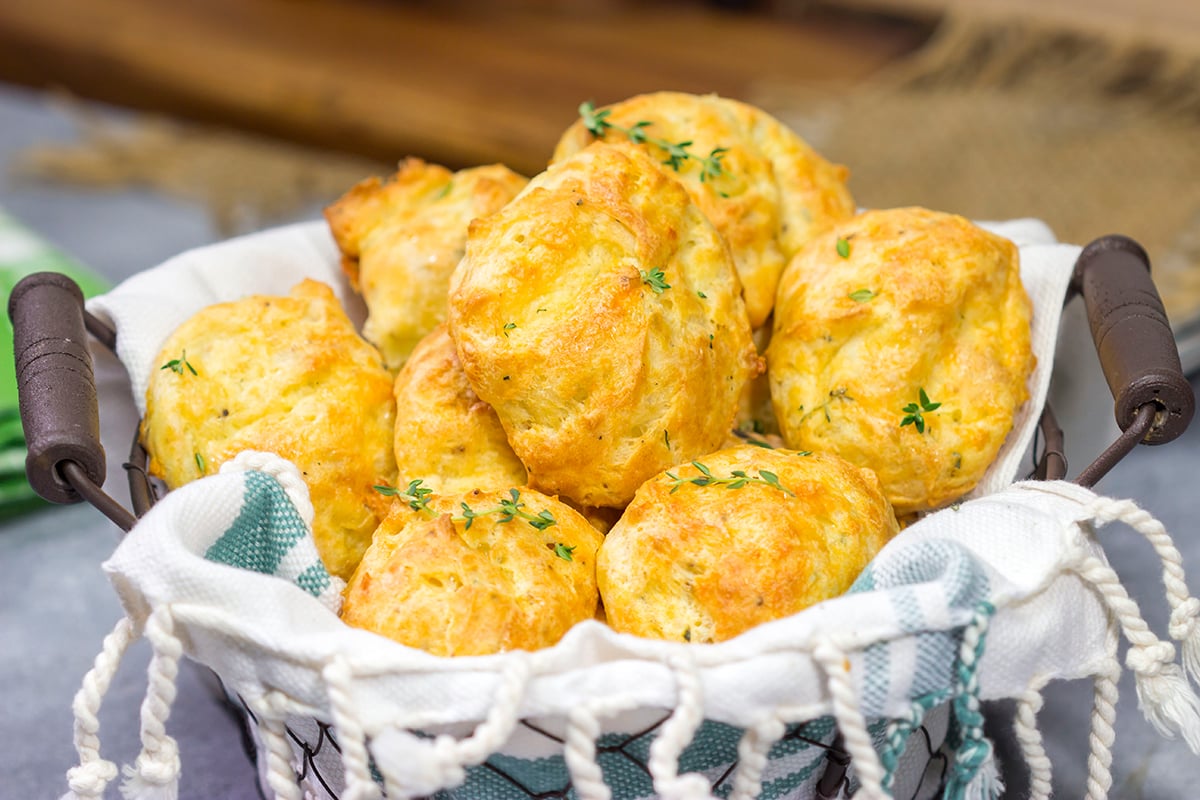 These Cheddar Cheese Puffs (also called Gougeres) are light and airy, and they melt in your mouth. They're great as an appetizer or served next to a bowl of soup!