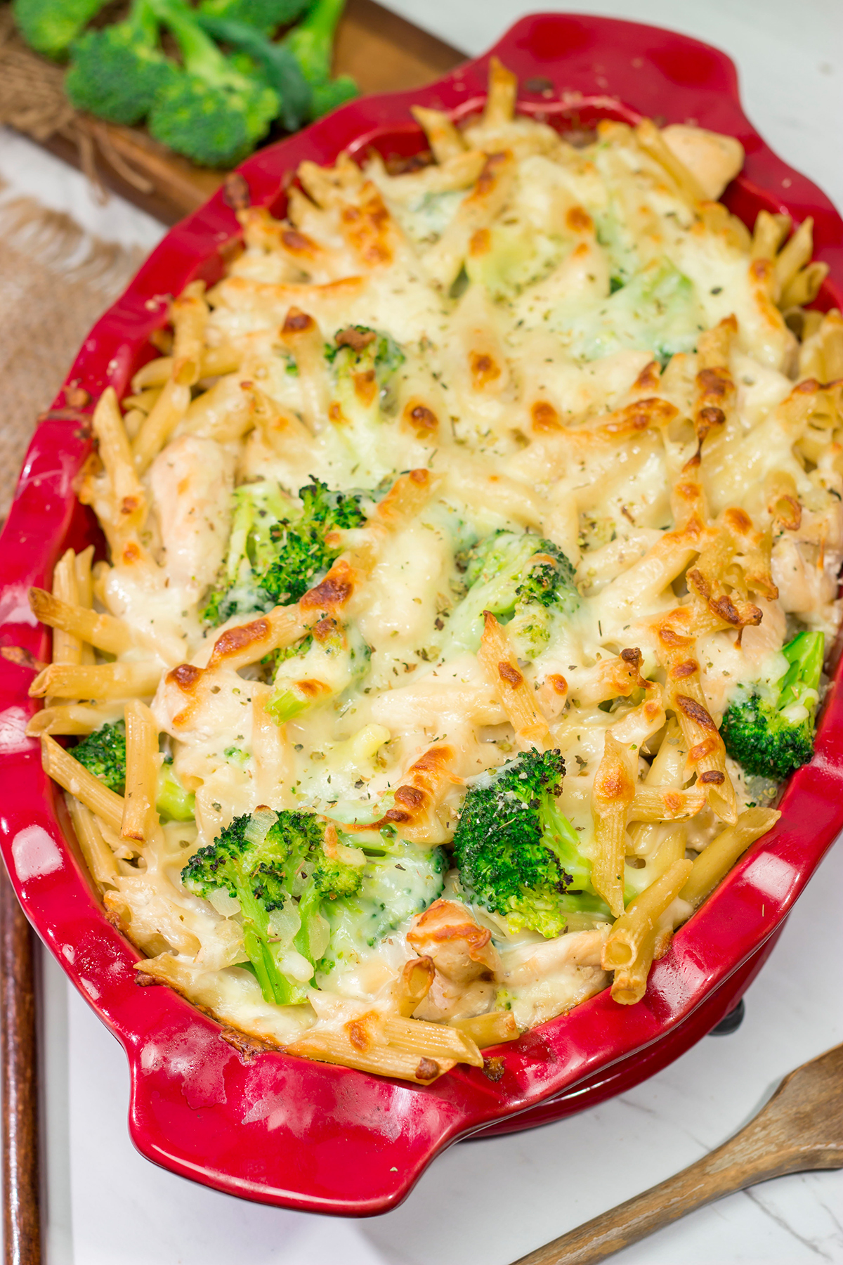 Filled with juicy chicken, broccoli and a cheesy alfredo sauce, this Cheesy Chicken and Broccoli Pasta Bake is a great comfort food meal!