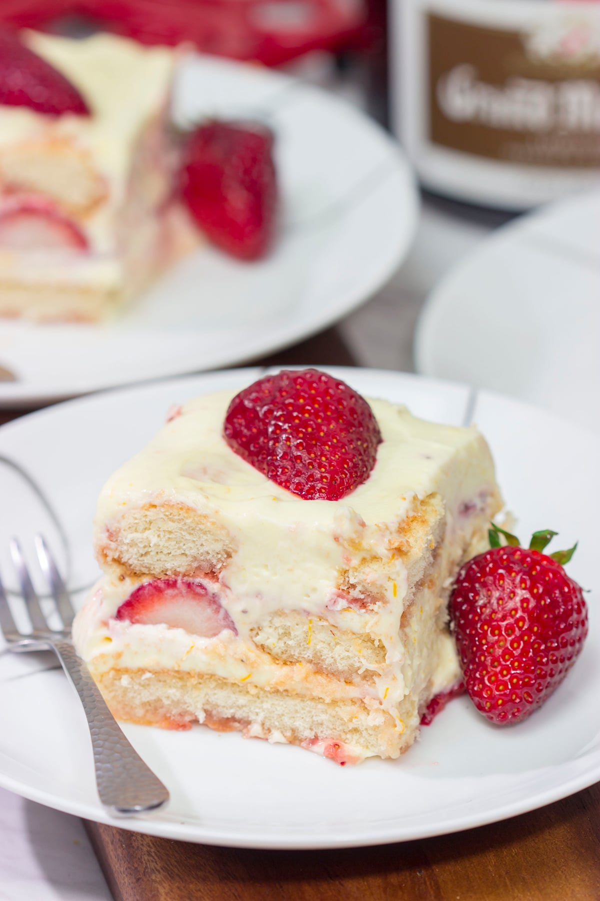 The traditional tiramisu flavors of coffee and cocoa are traded out for orange and strawberries in this Strawberry Tiramisu. It's a great summer dessert recipe!