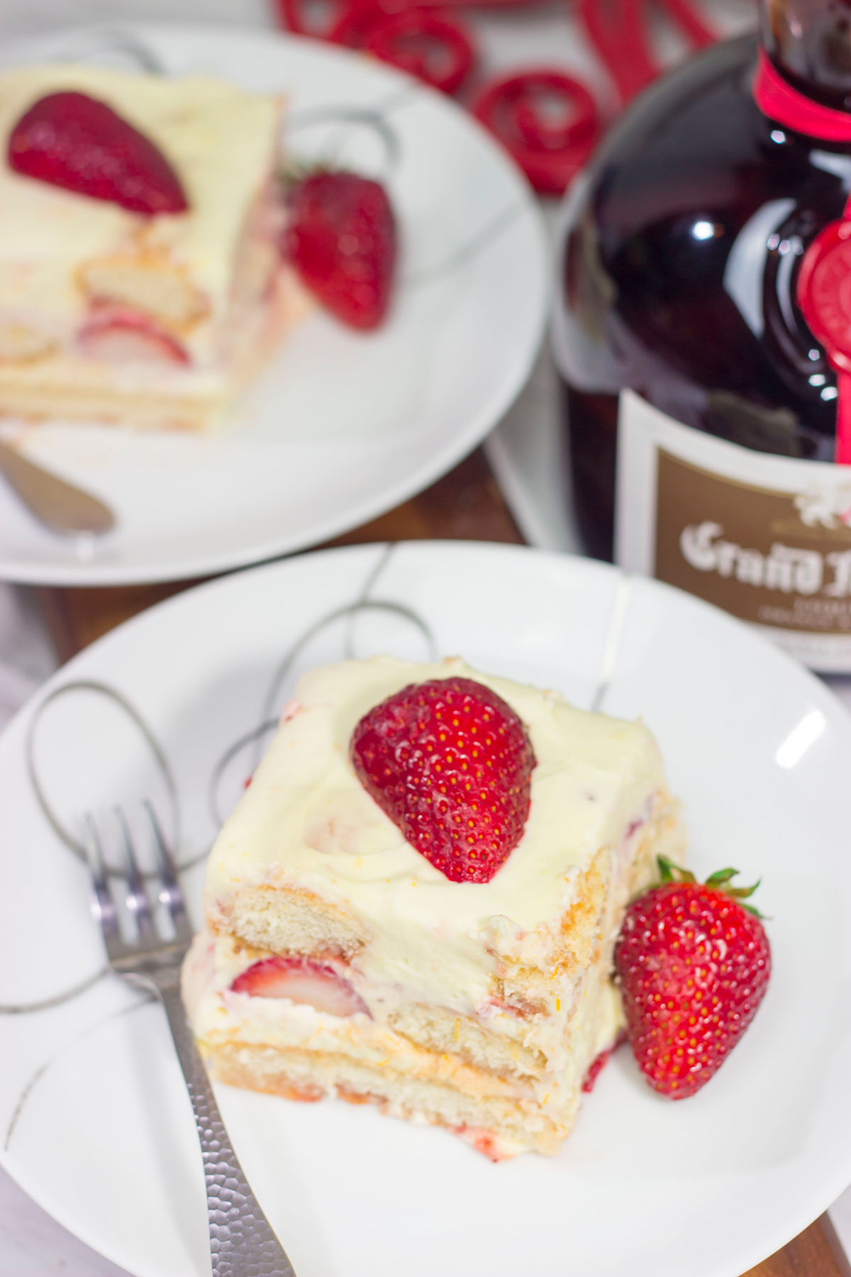 The traditional tiramisu flavors of coffee and cocoa are traded out for orange and strawberries in this Strawberry Tiramisu. It's a great summer dessert recipe!