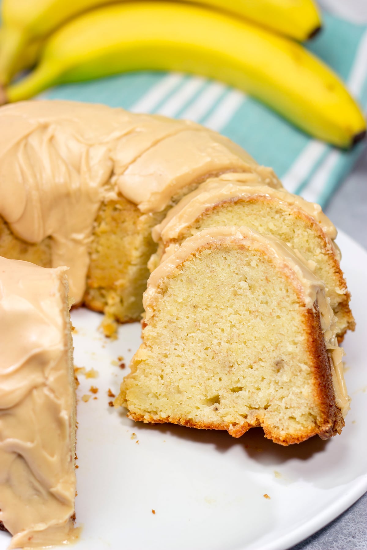 This Banana Pound Cake with Peanut Butter Frosting features a divine banana bread pound cake topped with a delicious peanut butter frosting. I think Elvis would've approved!