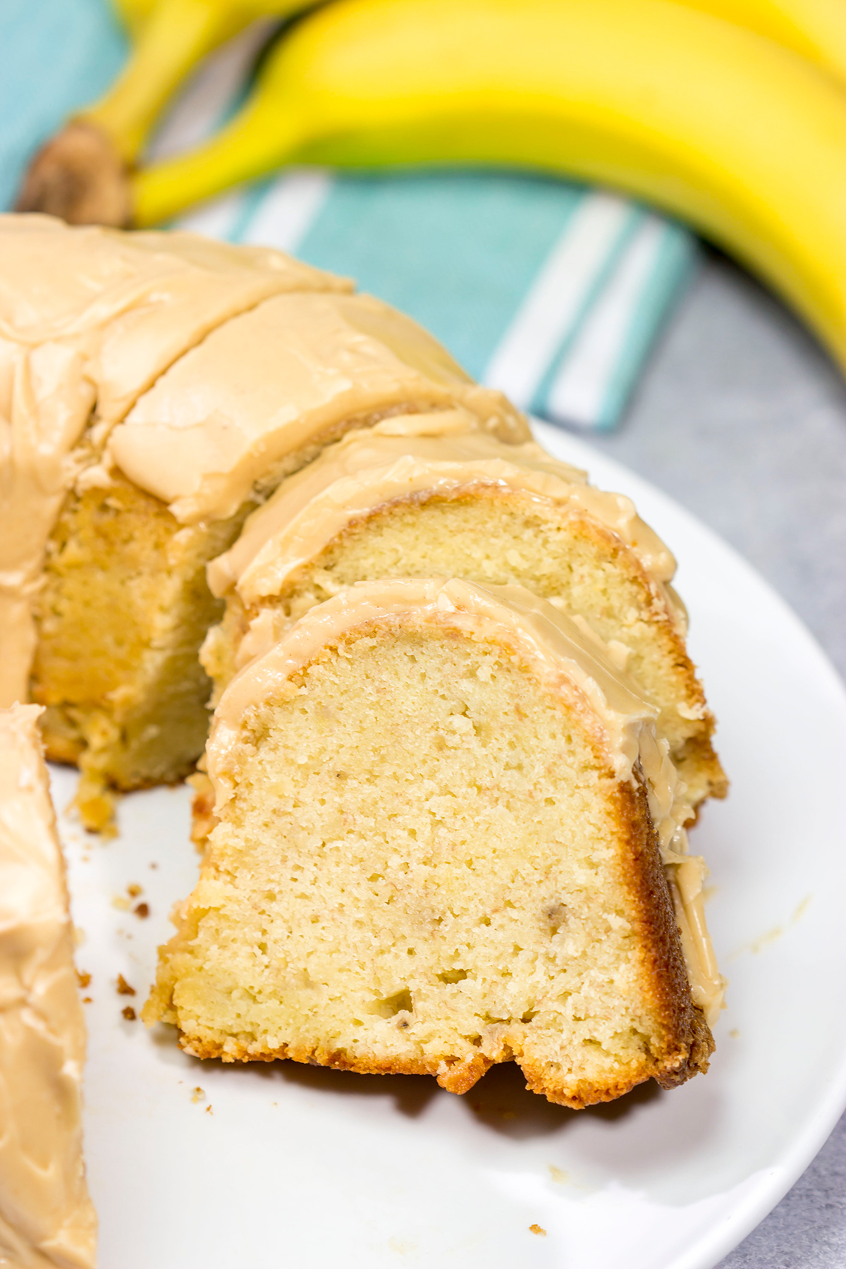 This Banana Pound Cake with Peanut Butter Frosting features a divine banana bread pound cake topped with a delicious peanut butter frosting. I think Elvis would've approved!