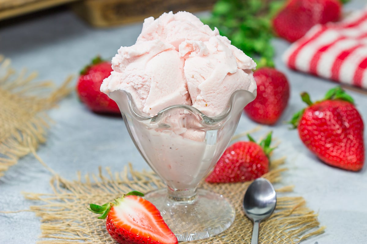 Made with fresh strawberries, a bowl of this Homemade Strawberry Sherbet is delightful on a warm summer day!