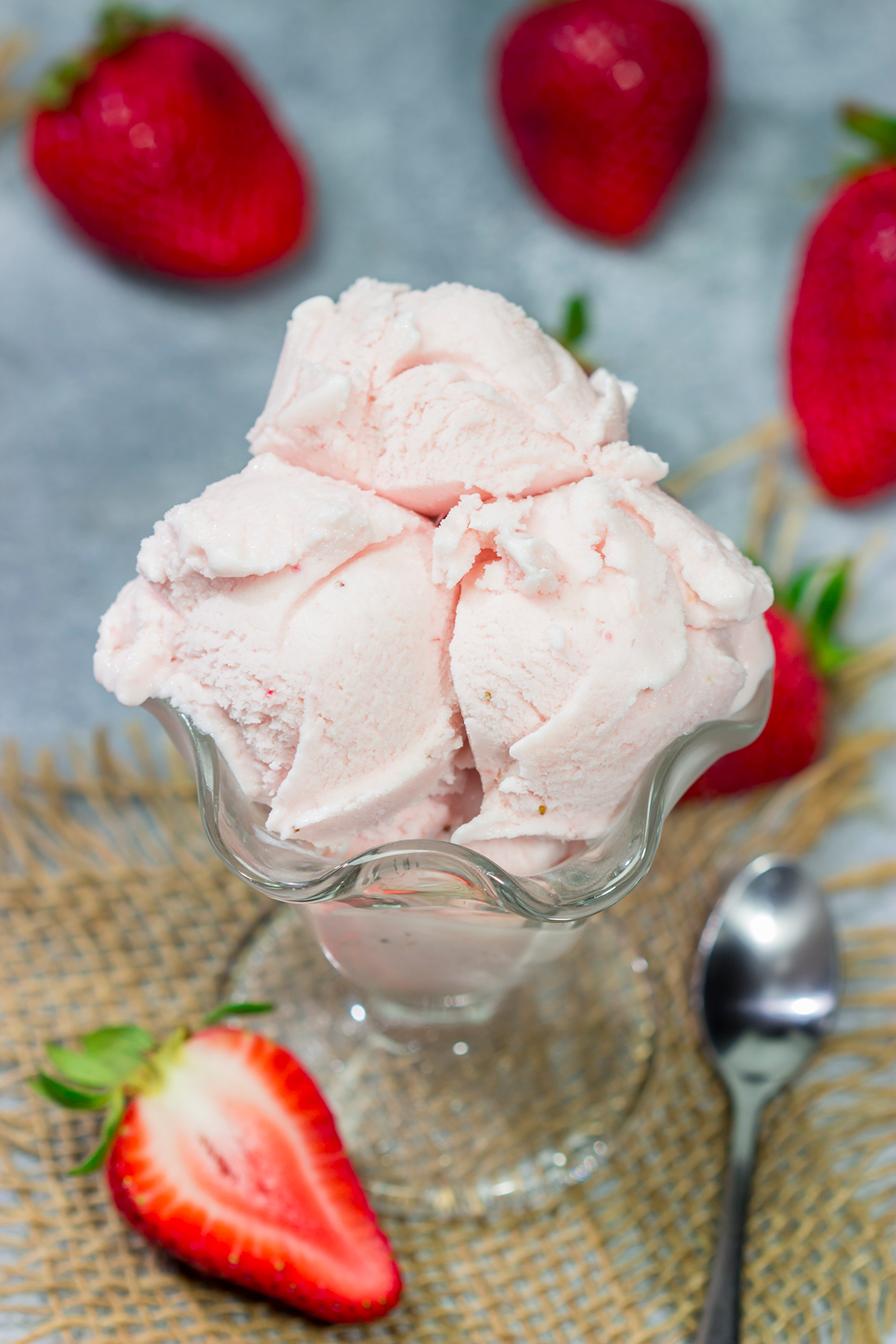 Made with fresh strawberries, a bowl of this Homemade Strawberry Sherbet is delightful on a warm summer day!