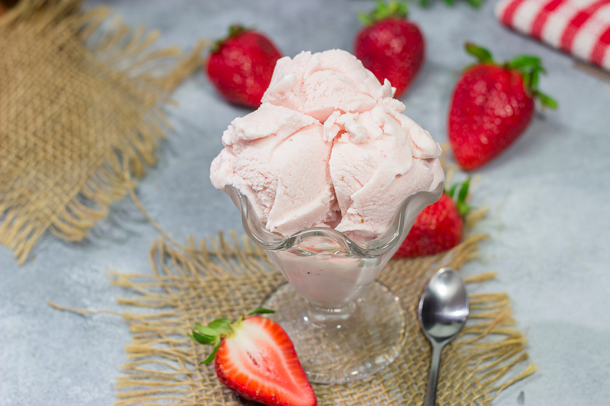 Made with fresh strawberries, a bowl of this Homemade Strawberry Sherbet is delightful on a warm summer day!