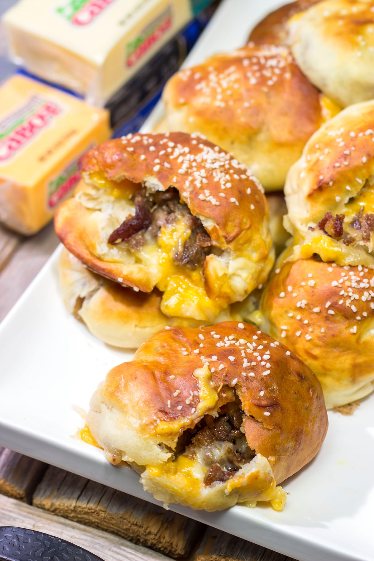 These Steak and Cheese Stuffed Pretzels feature warm, buttery soft pretzels stuffed with shaved steak and two types of cheese! Make a batch today!