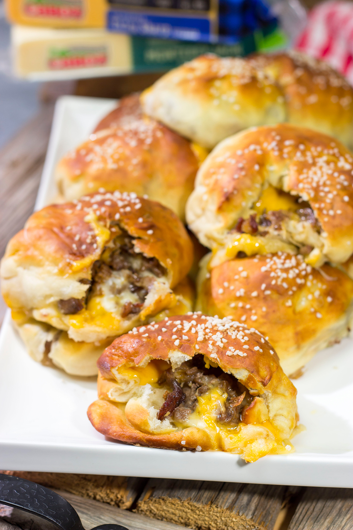 These Steak and Cheese Stuffed Pretzels feature warm, buttery soft pretzels stuffed with shaved steak and two types of cheese! Make a batch today!