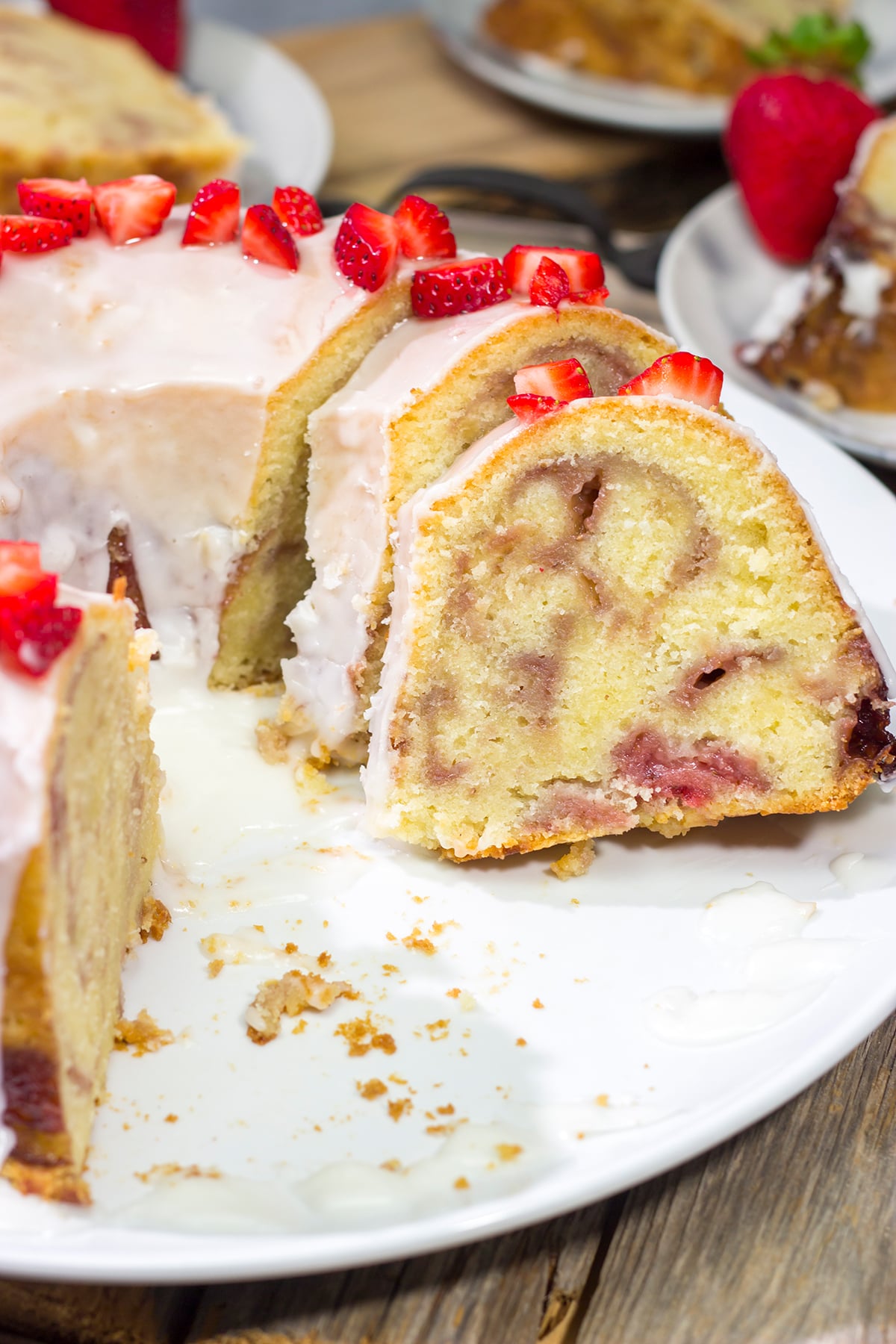 Featuring a sauce made from fresh strawberries swirled into the cake, this Strawberry Swirl Pound Cake makes for a delicious summer dessert!