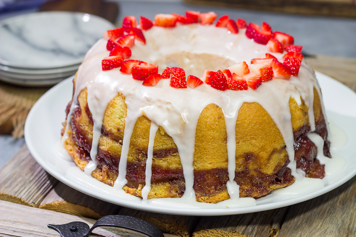 Featuring a sauce made from fresh strawberries swirled into the cake, this Strawberry Swirl Pound Cake makes for a delicious summer dessert!