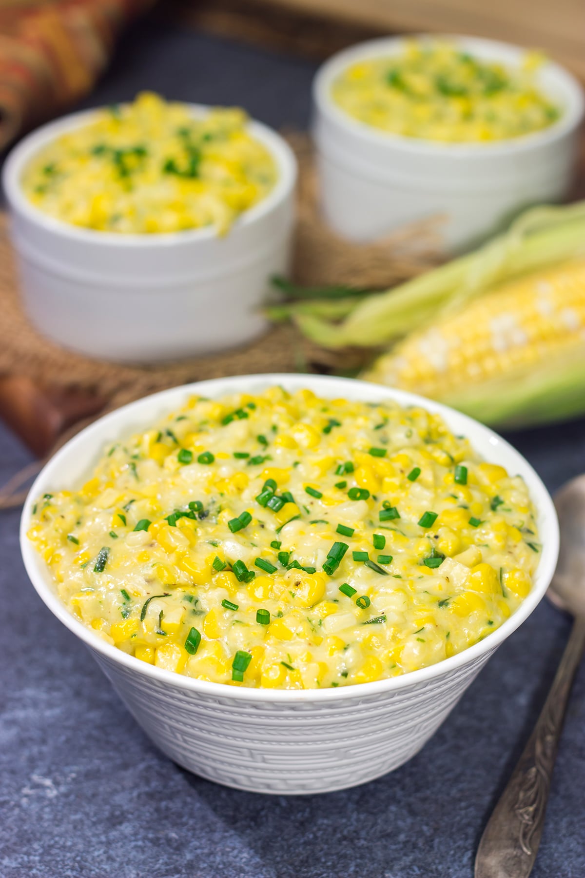 This Cheesy Creamed Corn recipe is a delicious way to celebrate sweet summer corn. Make a batch for dinner tonight!