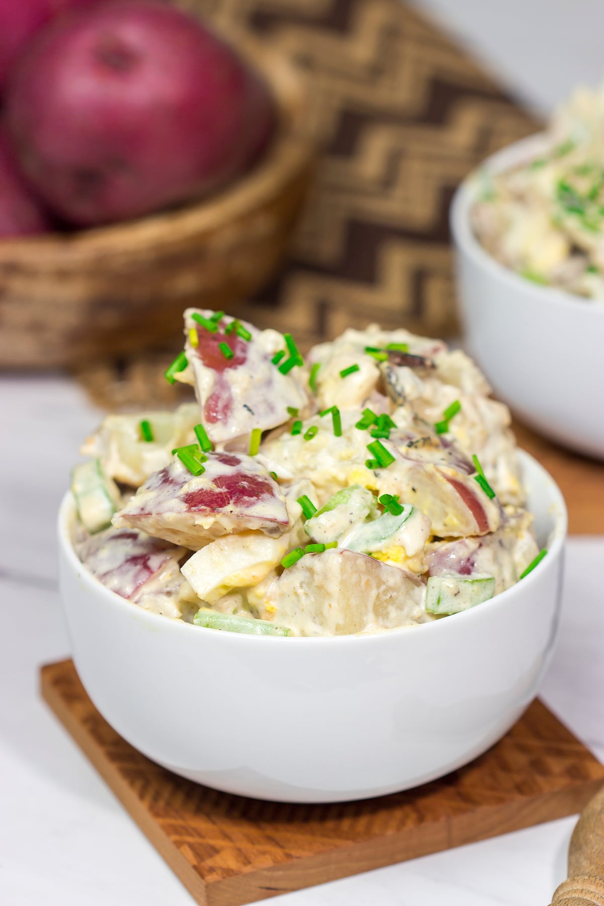 Put a twist on a classic summer side dish! This Caesar Potato Salad uses a bit of creamy Caesar salad dressing for added flavor - it's delicious!