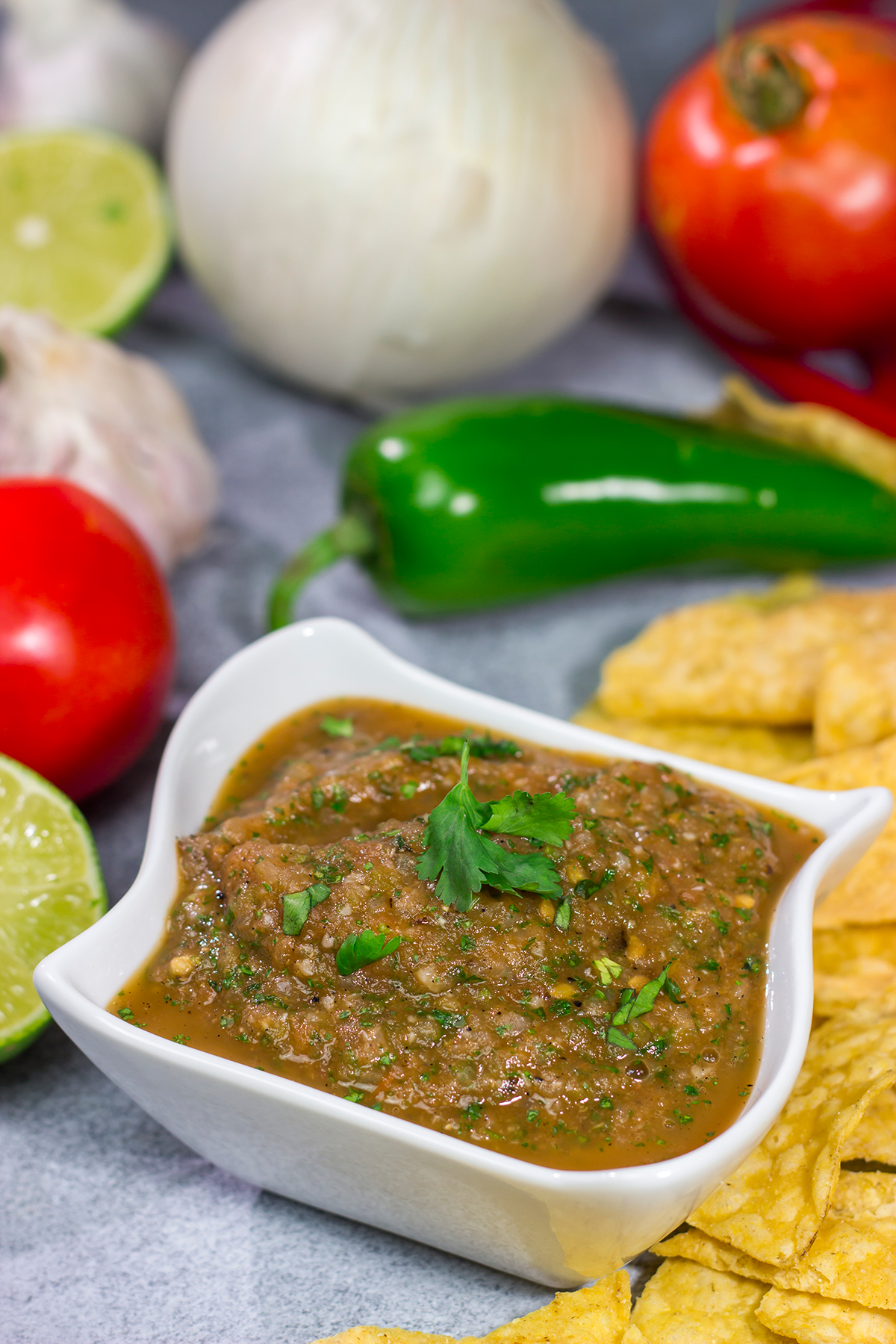 The added smoky flavor from the grill makes this Grilled Tomato Salsa a delicious summer snack!