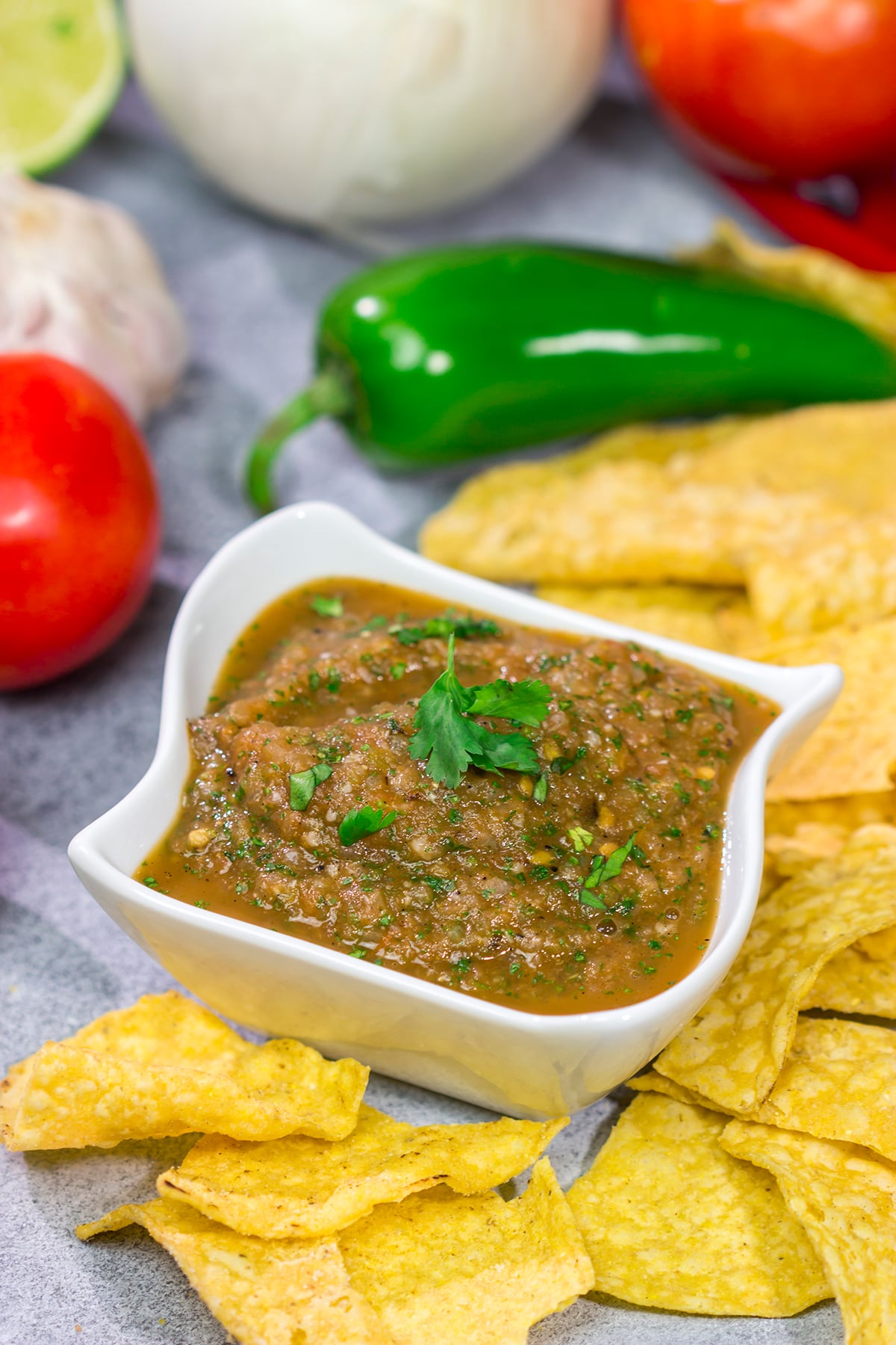 The added smoky flavor from the grill makes this Grilled Tomato Salsa a delicious summer snack!