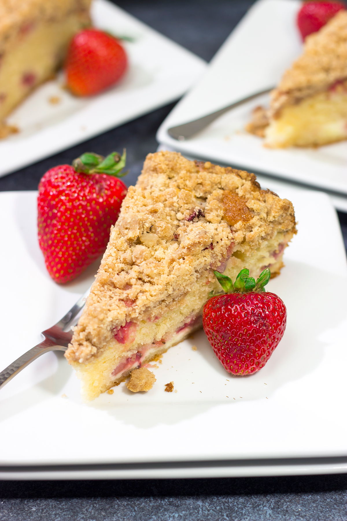 This Strawberry Cream Cheese Coffee Cake is a cross between a breakfast Danish and a coffee cake - it's a delicious way to celebrate fresh strawberry season!
