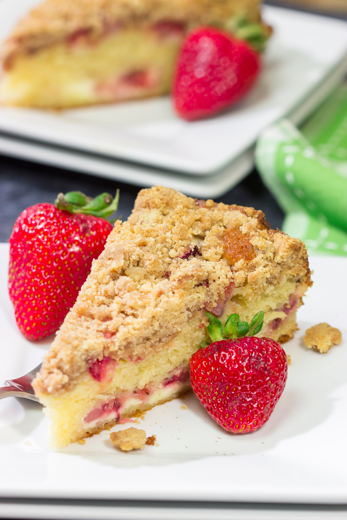 This Strawberry Cream Cheese Coffee Cake is a cross between a breakfast Danish and a coffee cake - it's a delicious way to celebrate fresh strawberry season!