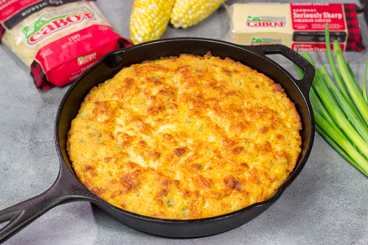 Loaded with cheddar cheese and fresh corn, this Cheesy Skillet Cornbread is a great side dish for late summer or fall meals!