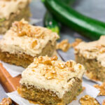 Looking for a way to use up extra zucchini? Bake it into a cake! This Zucchini Cake with Cream Cheese Frosting is a favorite dessert in our house every summer!