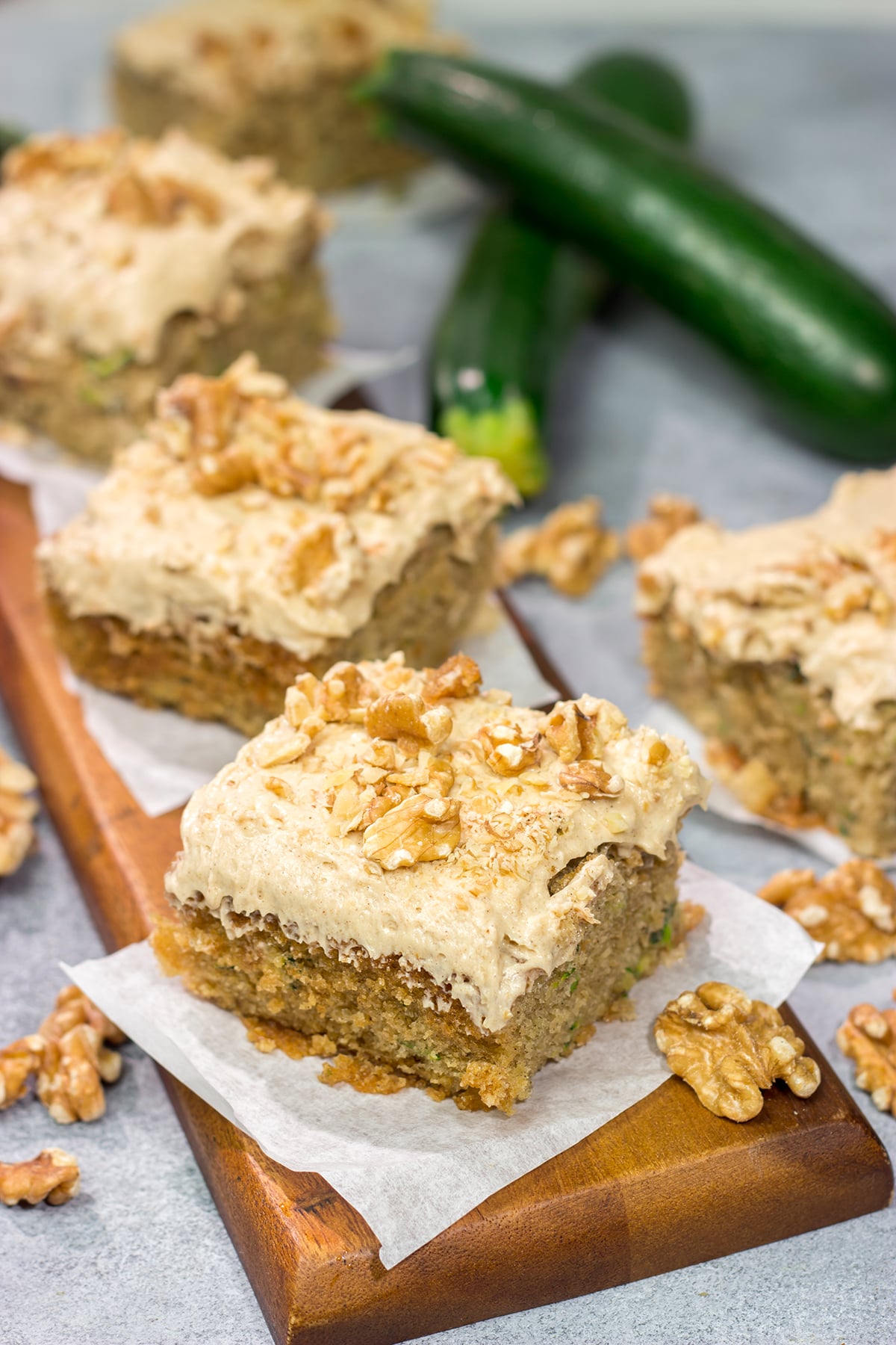 Looking for a way to use up extra zucchini? Bake it into a cake! This Zucchini Cake with Cream Cheese Frosting is a favorite dessert in our house every summer!