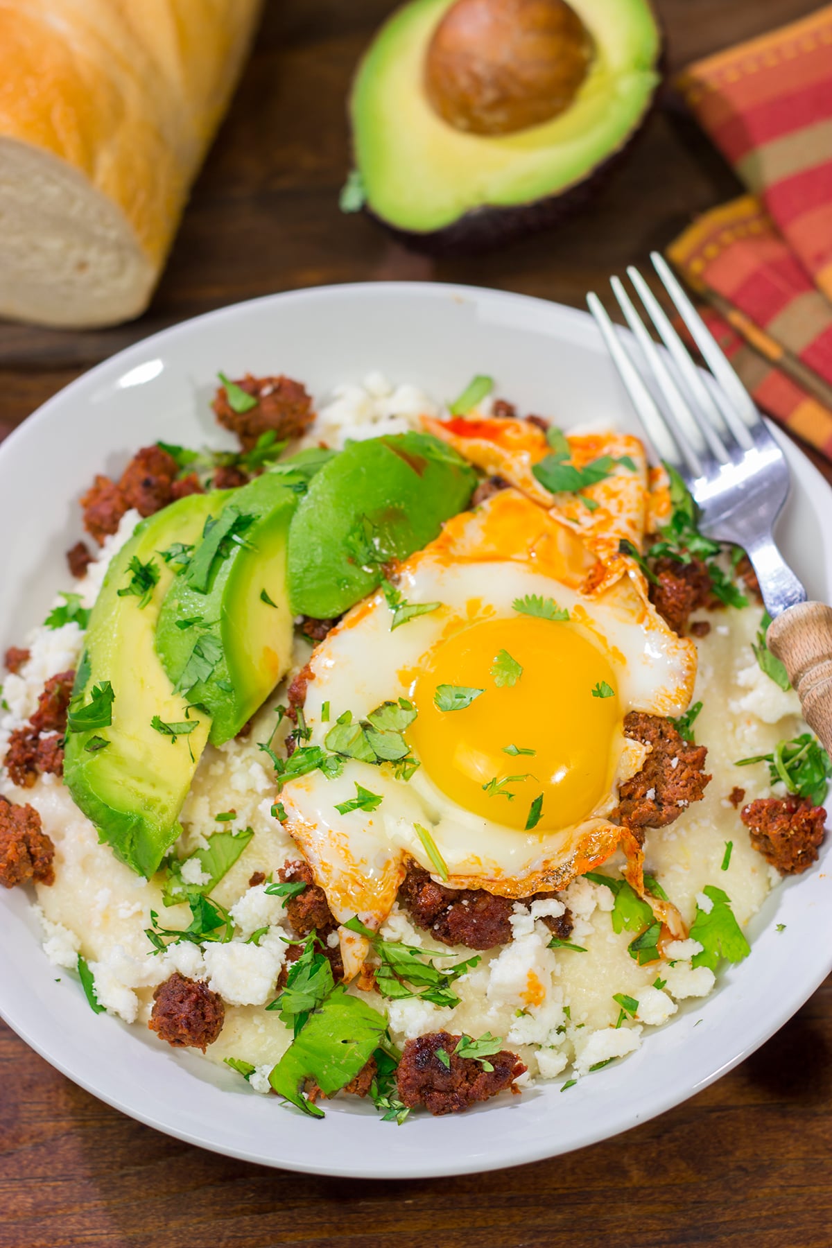 Classic Mexican meets classic Southern with this Huevos Rancheros Grits Bowl! Serve this grits bowl for brunch, and everyone will be begging for more!