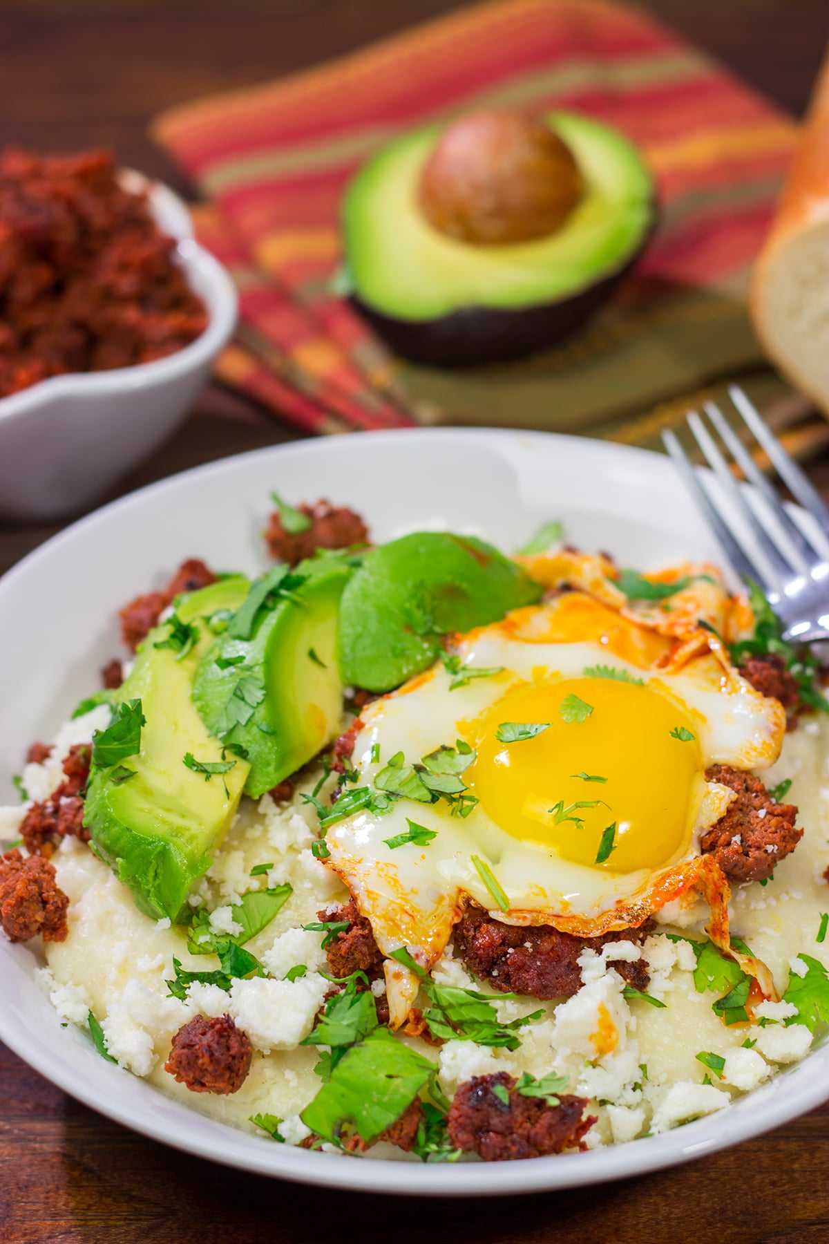 Classic Mexican meets classic Southern with this Huevos Rancheros Grits Bowl! Serve this grits bowl for brunch, and everyone will be begging for more!