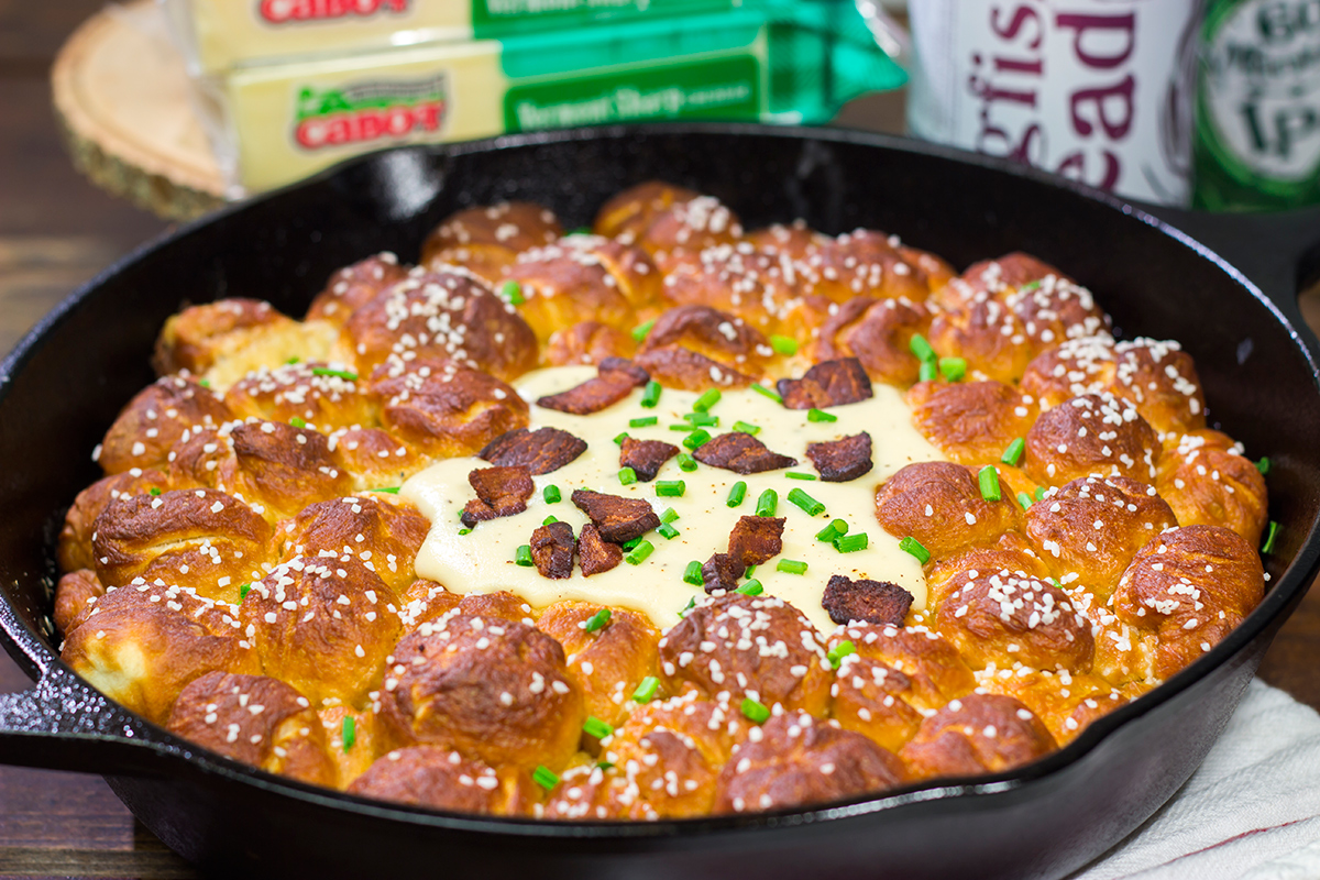 This Pull Apart Pretzel Skillet features warm, soft pretzels served with Beer Cheese. It's the perfect way to celebrate Oktoberfest and Autumn days in general!